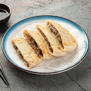 Лепешка из свинины 猪肉馅饼