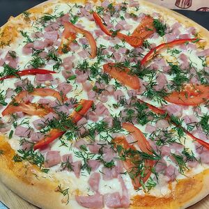 Пицца с ветчиной