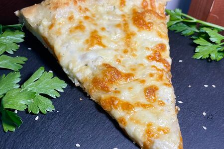 Кусочек пиццы Четыре Сыра