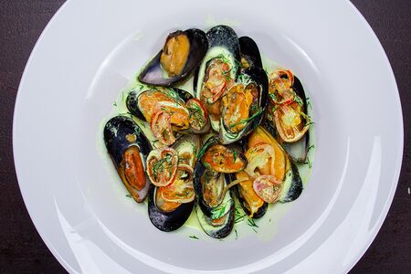 Голубые мидии, томленные в сливках