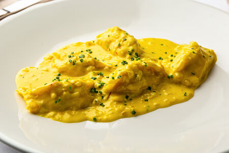 Равиоли с крабом и лососем