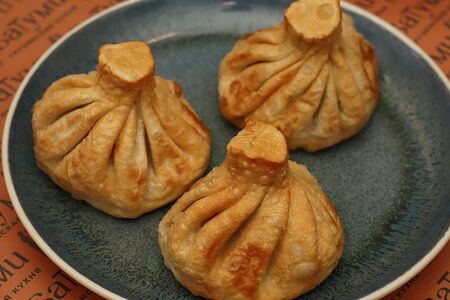 Жареные хинкали с грибами и сыром