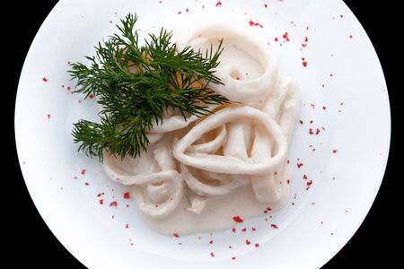 Кальмары в сливочном соусе