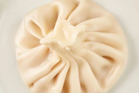 Хинкали с бараниной и зеленью