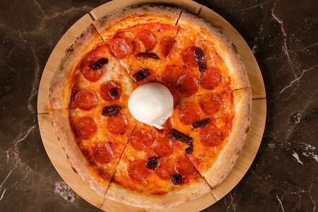 Фирменная пицца Дьяволо с Бураттой