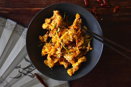 Карамелизованная свинина в кисло-сладком соусе