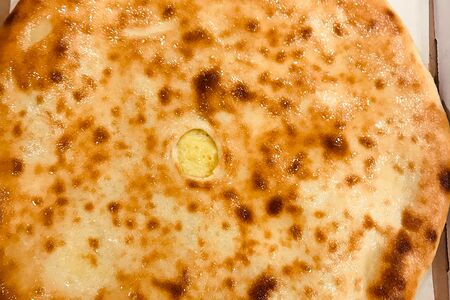 Осетинский пирог с сыром и зеленым луком