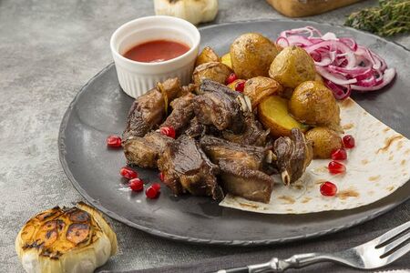 Бараньи ребрышки на углях