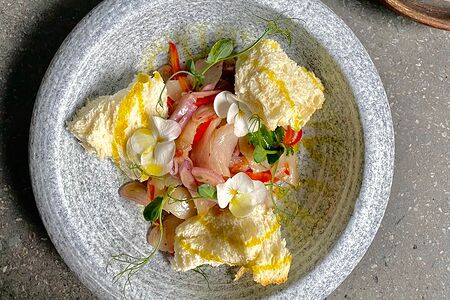 Байкальский сугудай из хариуса с маслом и луком