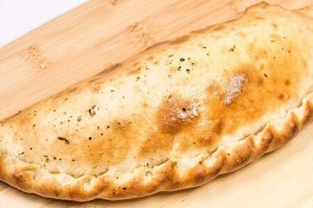 Кальцоне с ветчиной и грибами 300г