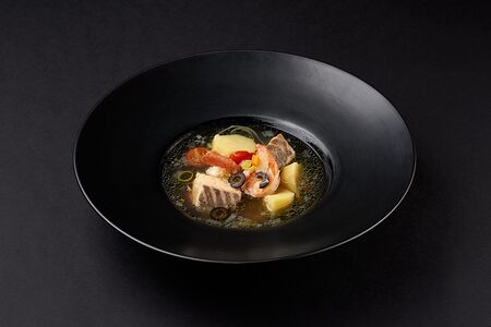 Уха из семги на бульоне из трех видов рыб