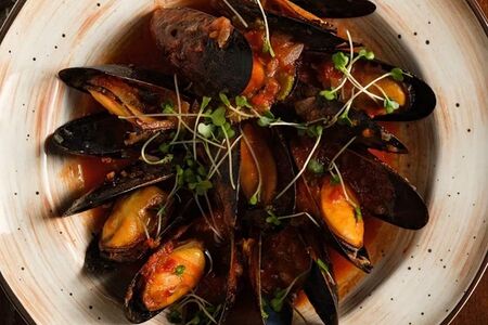 Мидии в томатном соусе