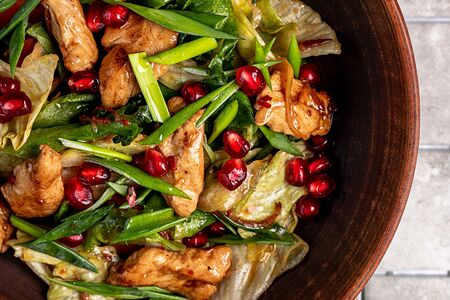 Теплый салат с куриным филе ткемали