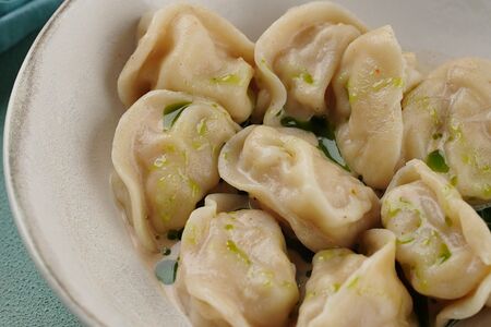 Пельмени с гребешком и креветкой