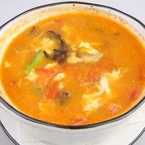 Бульон с овощами и яйцом