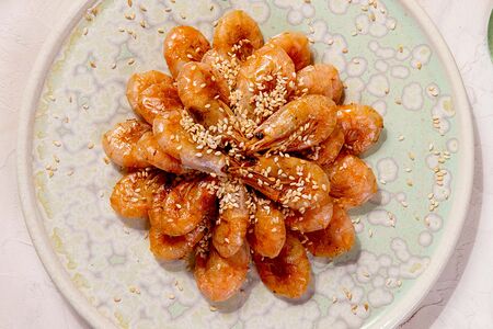 Северные креветки жареные в кунжуте