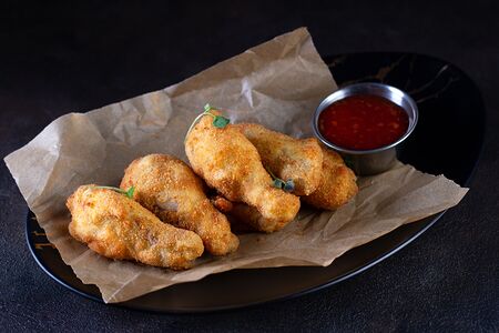 Куриные крылышки в панировке