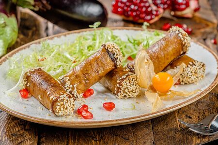 Рулетики из баклажанов с ореховой начинкой