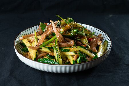 Салат из огурцов со свиными ушами