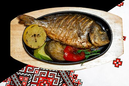 Дорадо запечённая 