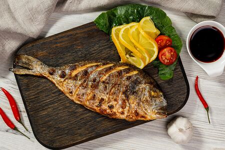 Дорадо на мангале