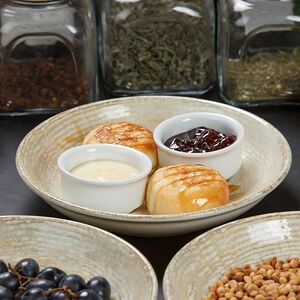 Сырники со сгущенкой и малиной