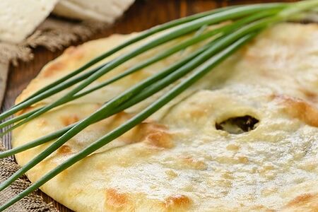 Осетинский пирог с сыром и зеленым луком