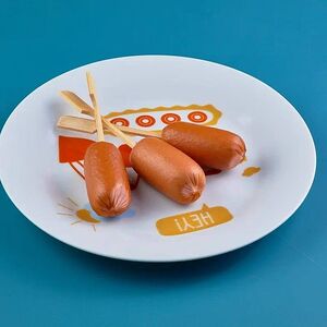 Отварные куриные сосиски