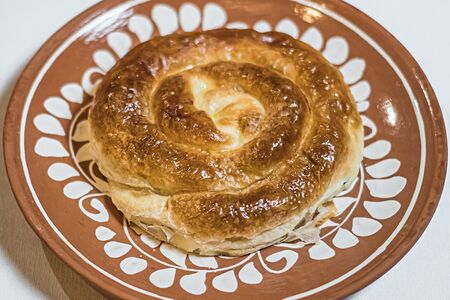 Запеченная плацында с капустой