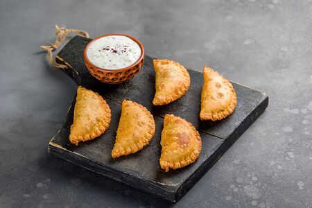 Мини чебуреки с соусом дзадзыки