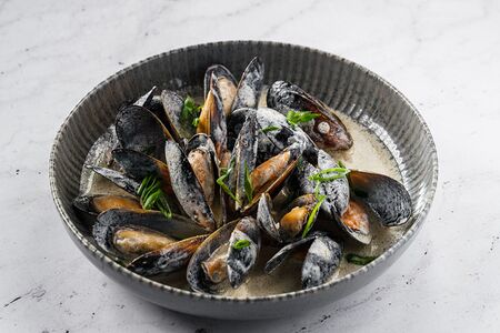 Мидии в сливочном соусе