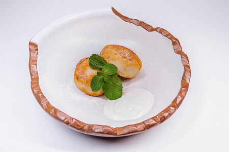 Сырники со сметаной