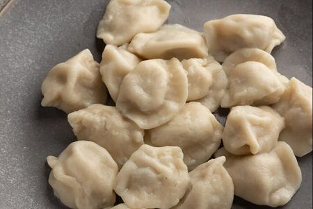 Вареные пельмени говядина-курица