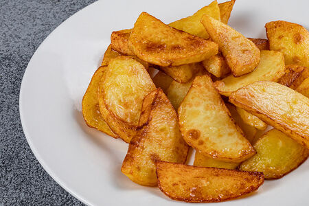 Картофель, жаренный на сливочном масле