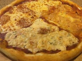 Пицца четыре сыра