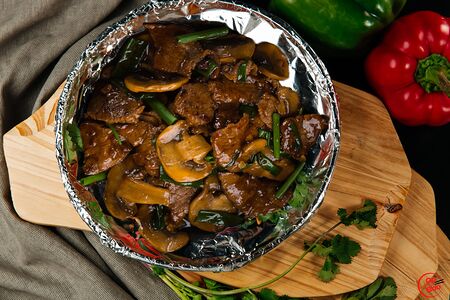 Говядина жареная с шампиньонами