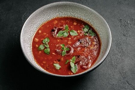 Наваристый мясной суп с пастрами, копченой паприкой, томатами и каперсами