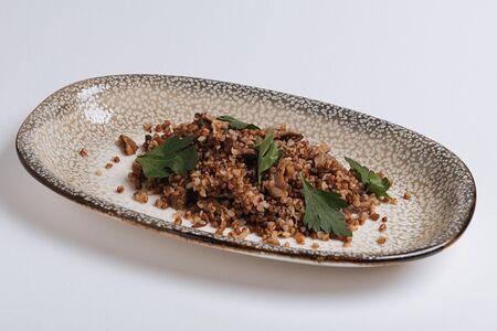 Греча с луком и грибами