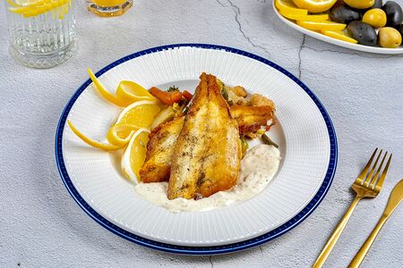 Сибас на овощной подушке