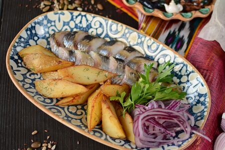 Сельдь с картофелем