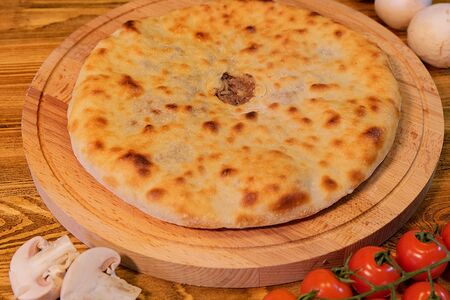 Осетинский пирог с мясом и грибами   
