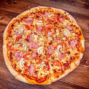 Пицца с ветчиной и грибами