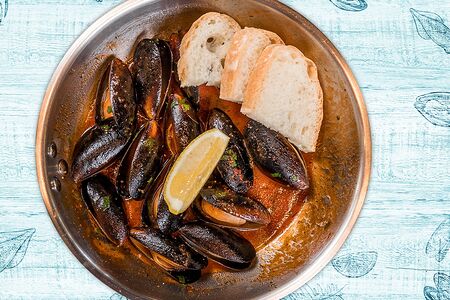 Мидии в томатном соусе