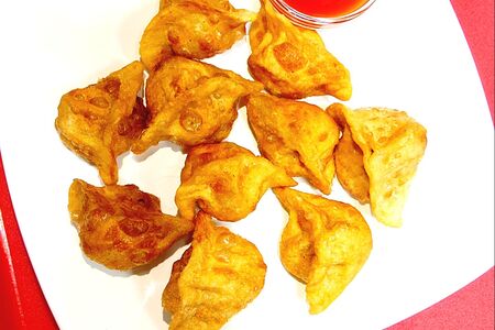 Пельмени жареные со свининой