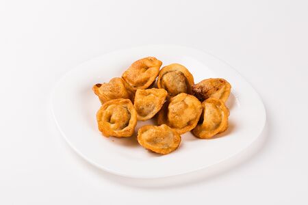 Пельмени жареные