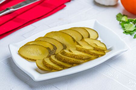 Огурцы соленые