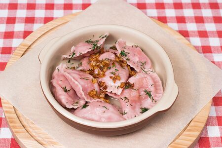Вареники с капустой и свининой с жаренным луком