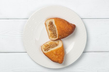 Пирожок жареный с капустой