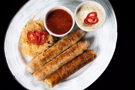 Колбаски на гриле