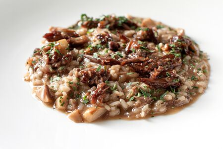 Ризотто с бычьими хвостами и грибами